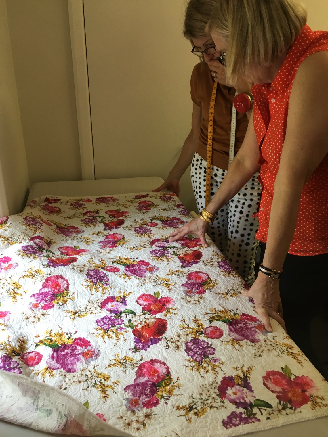 Margie and Susan contemplate pattern placement